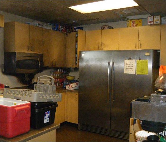 Commercial kitchen with fire and smoke damage