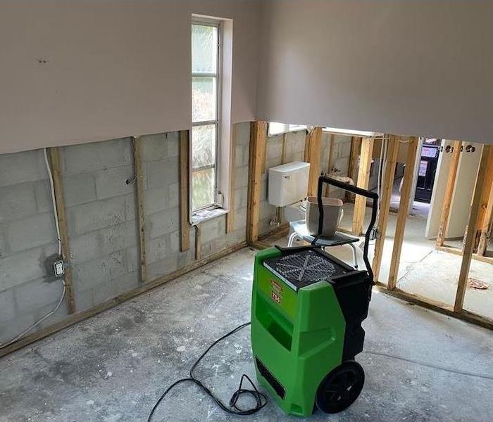 Home with flood cuts and SERVPRO drying equipment